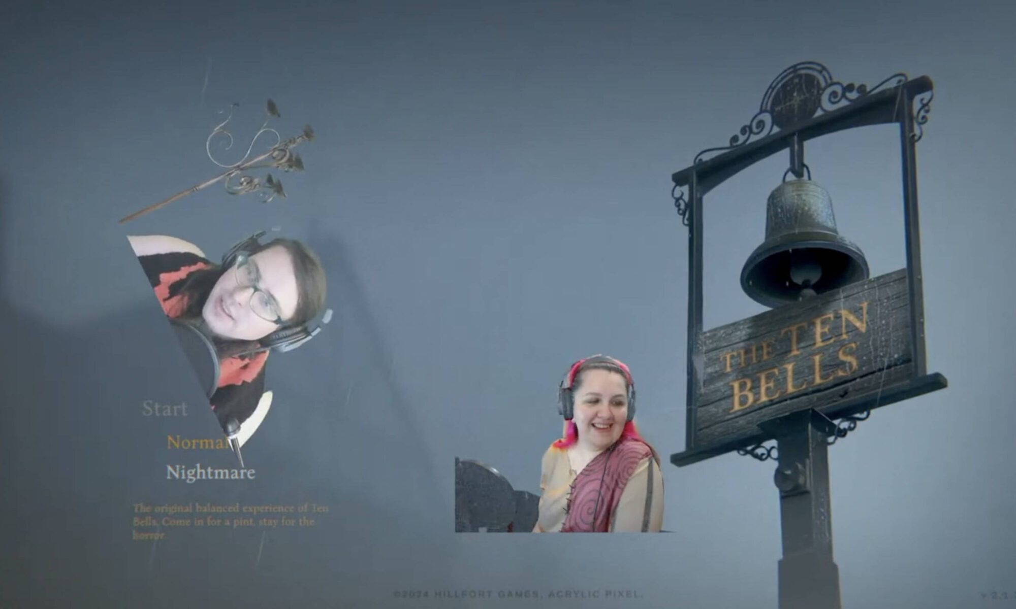 A screenshot of the title screen of Ten Bells showing Joe and Lauryn's cameras int he foreground. Joe wears a pumpkin scarf handmade by Laxmi13 and Lauryn wears a Sally from Nightmare before Christmas costume.